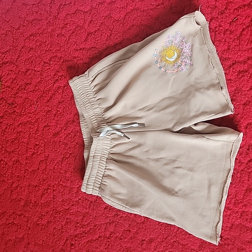 Tan long shorts. Brand:ultra flirt. Size: M